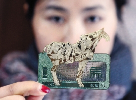 图为中国首套青铜生肖藏书票系列之“马到成功” 