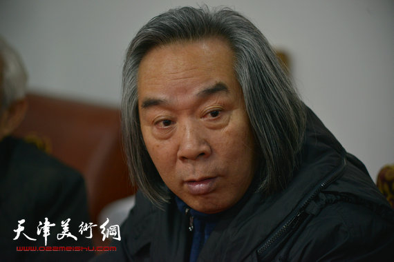 2014年新春艺术界座谈会召开,霍春阳等书画家出席。图为霍春阳。