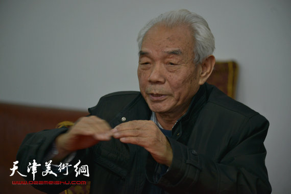 2014年新春艺术界座谈会召开,霍春阳等书画家出席。图为纪振民。