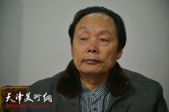 2014年新春艺术界座谈会召开,霍春阳等书画家出席。图为向中林。