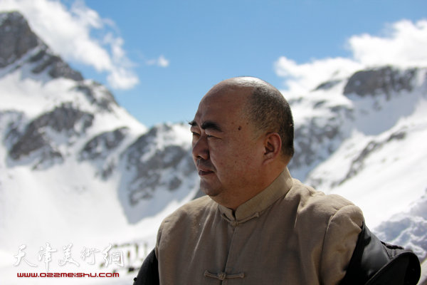 尹沧海登上玉龙雪山.