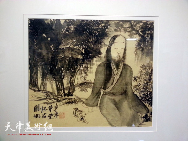 图为画展展出的李津作品。