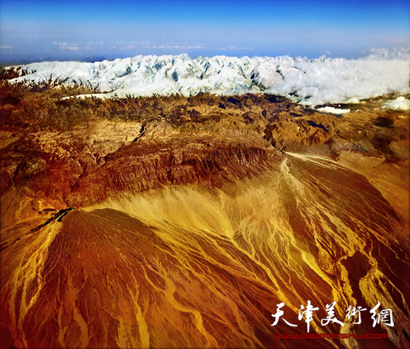 霍然摄影作品《白波九道流雪山》