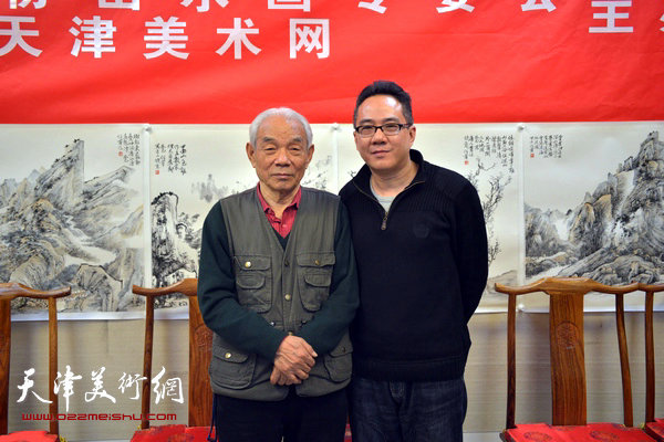 青年画家何宁山水画研讨会2月7日举行，图为纪振民、何宁。