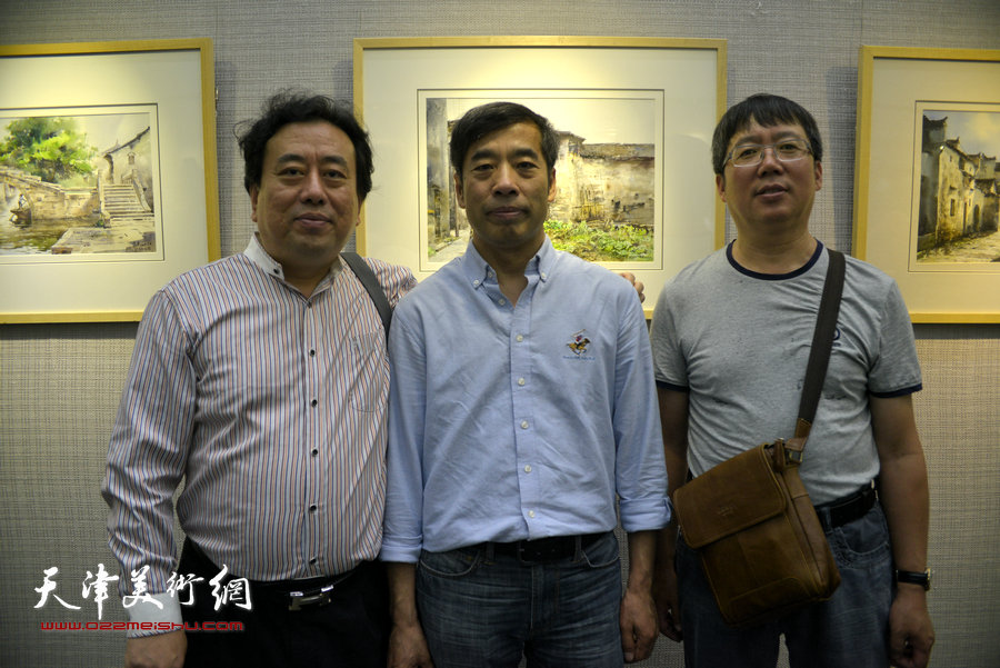 高建章、陆家明、齐宝成在杨俊甫水彩风景写生画展上。