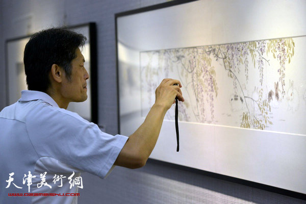 悦可妙心—张建永中国画小品展在天津图书馆开展，图为展览现场。