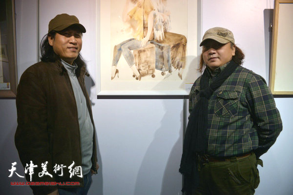 图为朱志刚、王刚在活动现场。