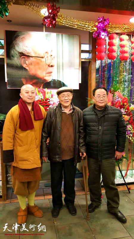 孙其峰先生家人长子孙长康、三子孙季康与智如法师在酒会上。