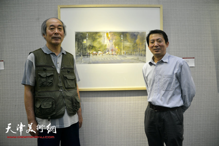 宋家褆、李建有在画展现场。