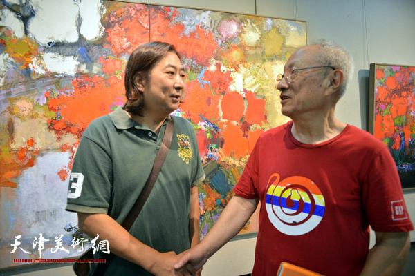 张京生、杨亦谦在天津美院美术馆。