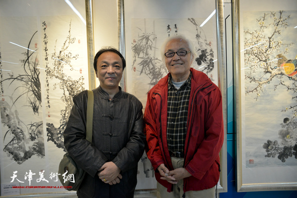 李庆增、楚岳牧在“秋之韵”书画展上。