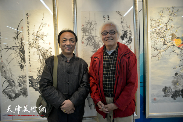 李庆增、楚岳牧在“秋之韵”书画展上。