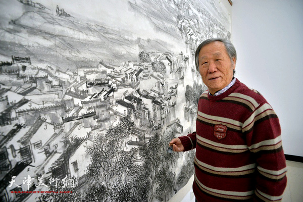 姬俊尧在创作山水巨制《江南春色》。