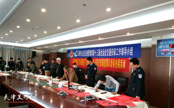 梅江书画院举办慰问公安交管局直属队新春送福活动现场。 