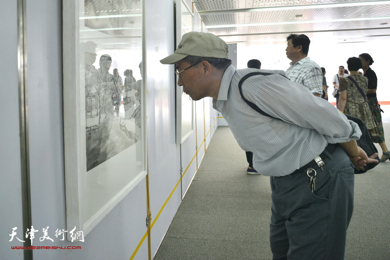 “素心若雪---肖培金中国画展”现场。