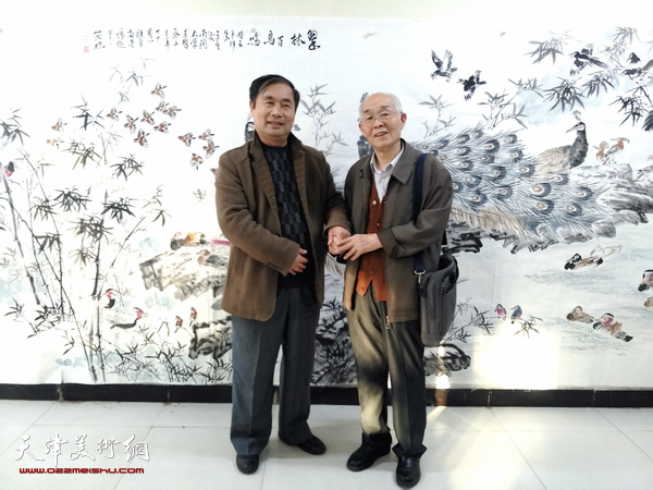郭文伟与许昌三国书画院院长赵永亮合影。