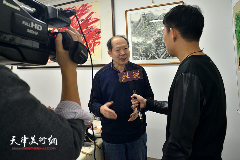 邬海清在活动现场接受北京湖社官网采访。