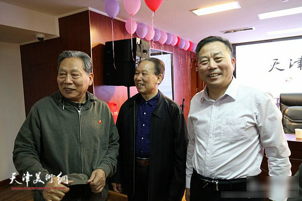 霍然、刘传光、刘有明在会议现场。
