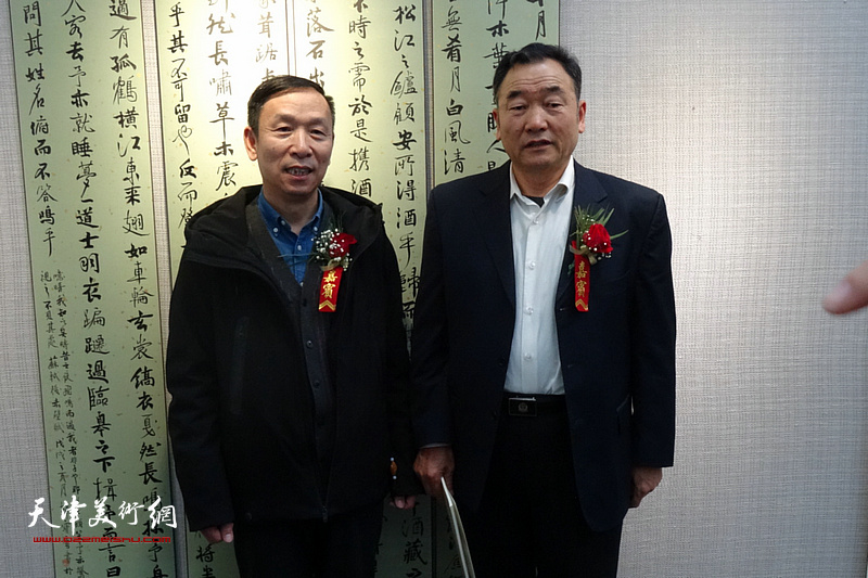 张建会、萧宜钦在展览现场。