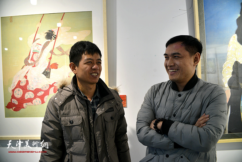 杨海涛、周文举在画展现场。