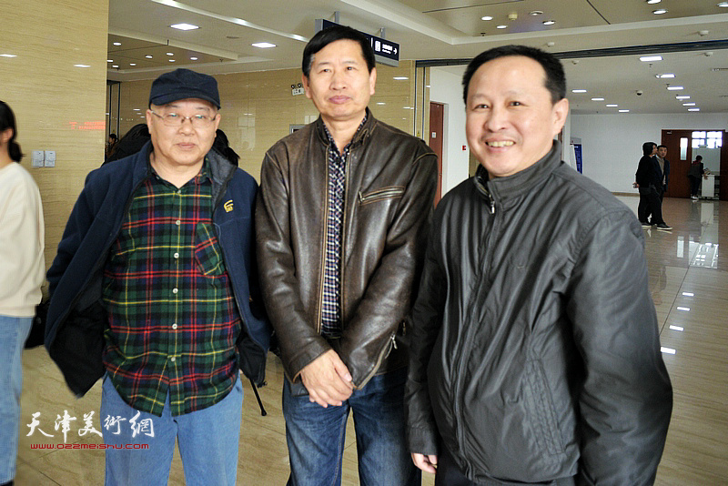 杨志刚、李桂金、张立涛在展览现场。