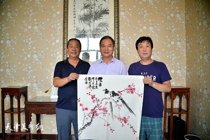 邢立宏、刘胜洋、王树成在文化交流活动现场。