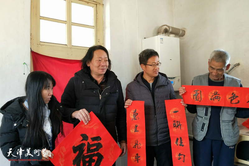 宁河区美术家协会开展新年下基层慰问贫困户暨文化下乡活动。