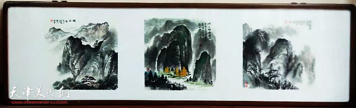 图为现场展示的穆怀安山水画作品