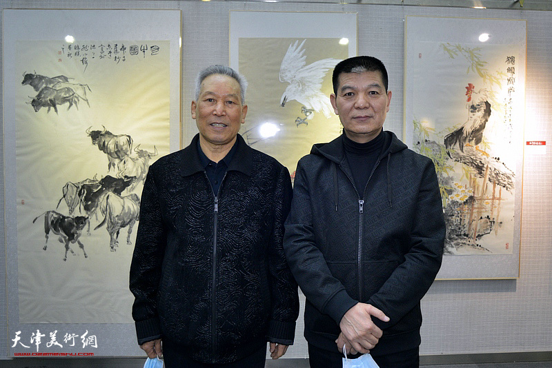 范扬、刘传光在画展现场。