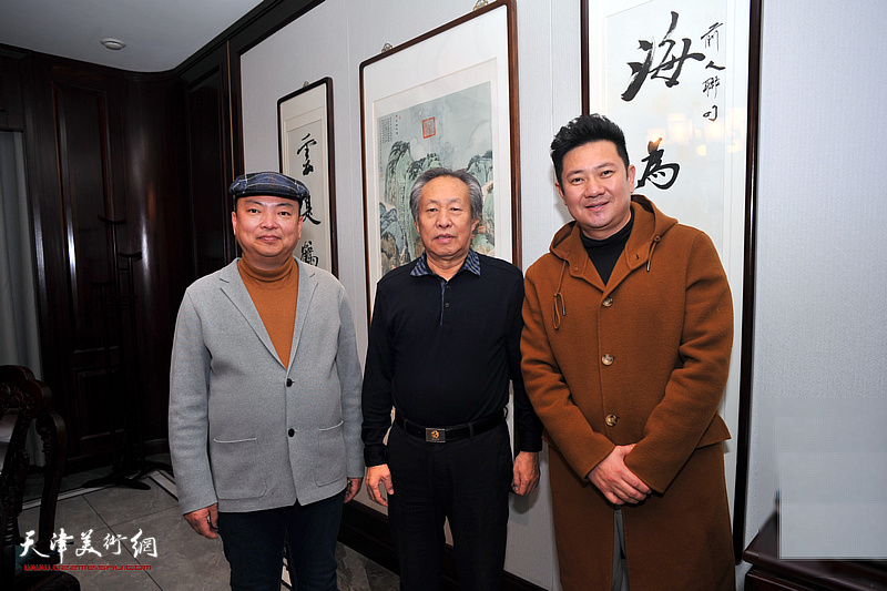 左起：范权、刘国胜、朱懿在活动现场。