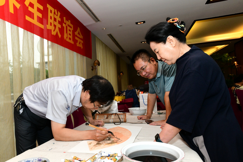 曹秀荣、路洪明、王建礼在活动现场